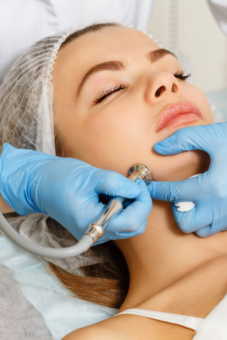 Woman receiving a microdermabrasion treatment